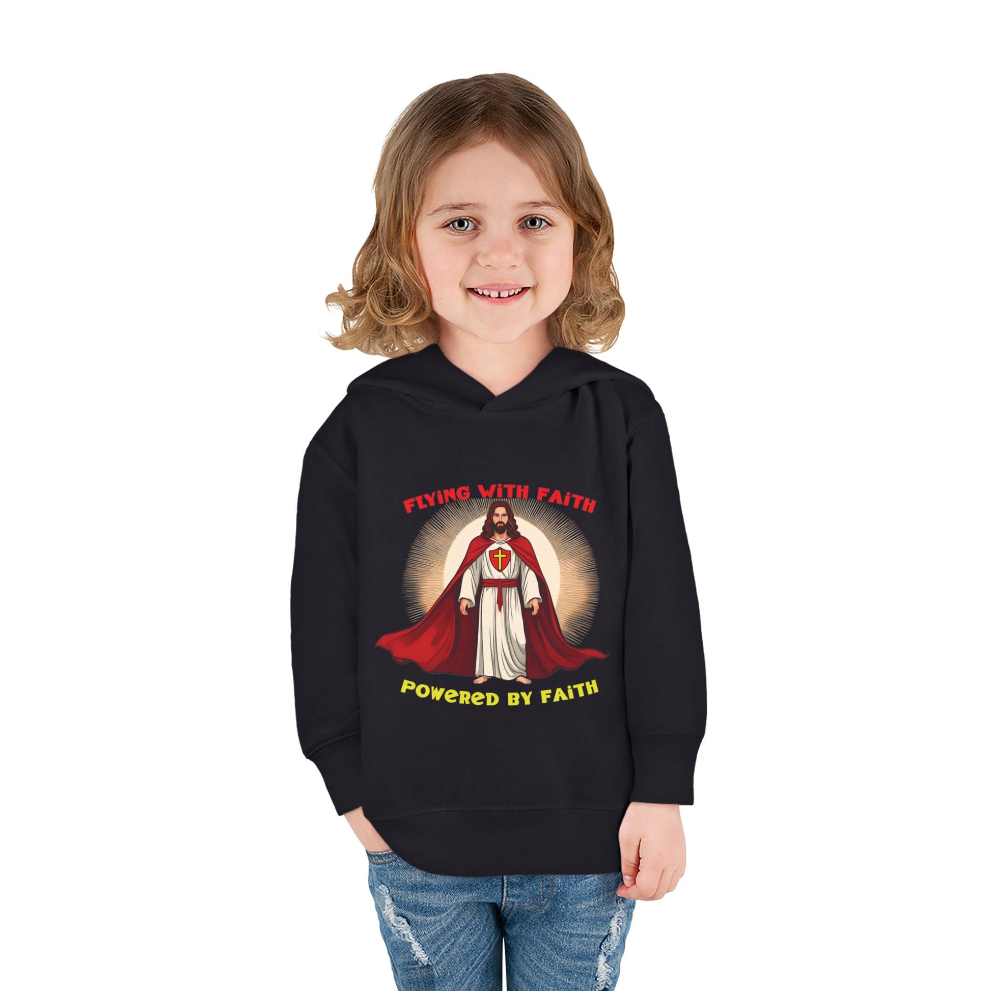 Toddler blue hoodie with Flying with Faith text and superhero Jesus graphic, vibrant Christian kids apparel