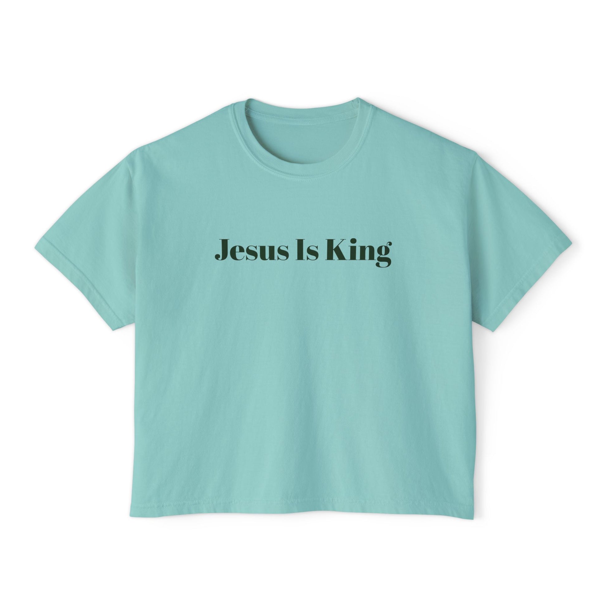 Light blue t-shirt with 'Jesus Is King' text on a white background