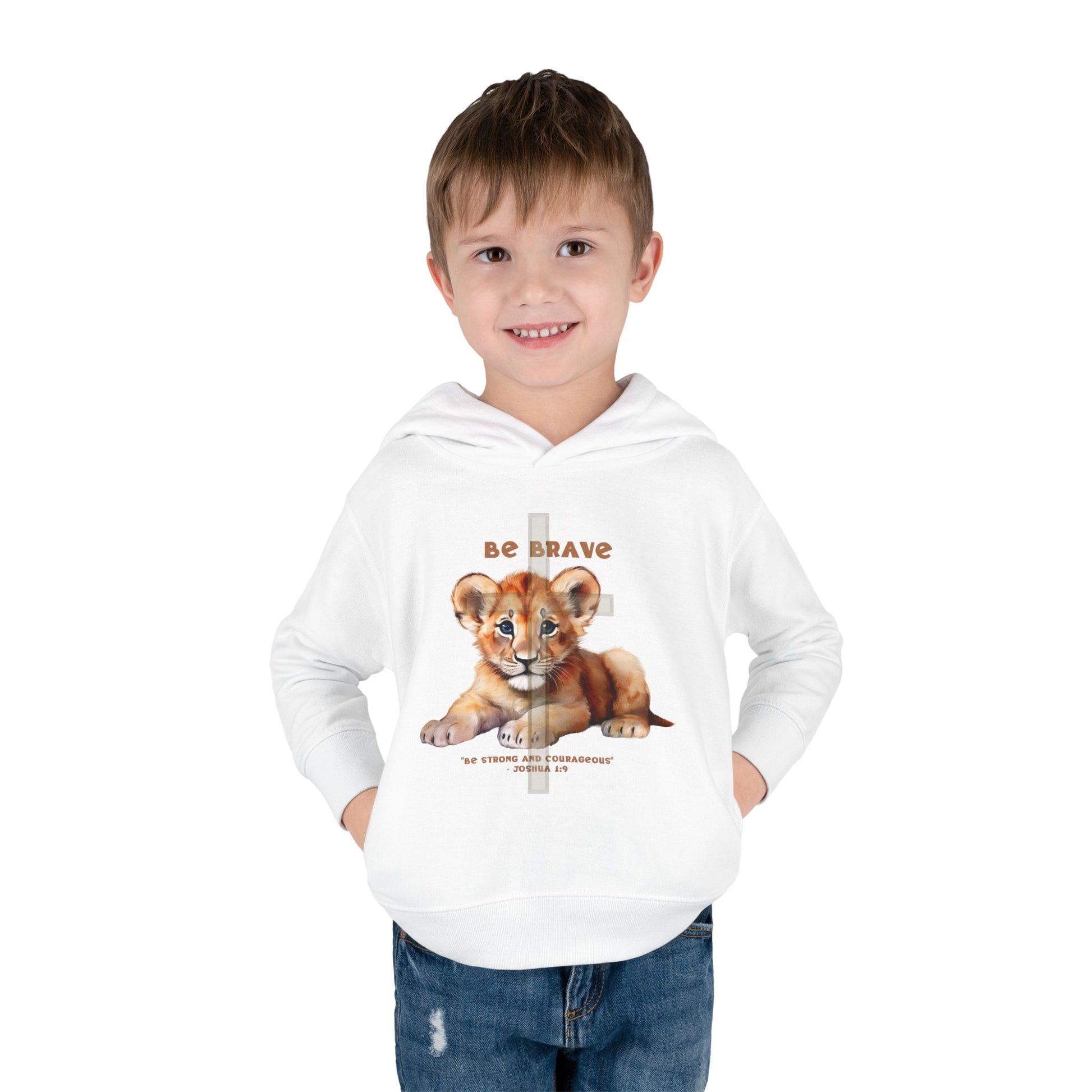 Child wearing a white hoodie with a lion graphic and 'Be Brave' text on a white background