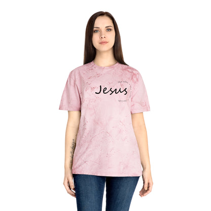 Person wearing a pink t-shirt with 'Jesus' printed on it against a white background