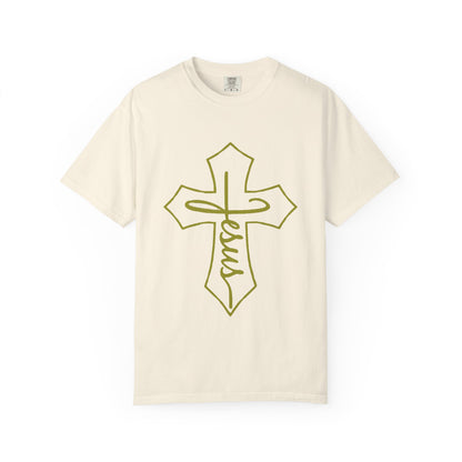 Beige t-shirt with a green cross and 'Jesus' text on a white background