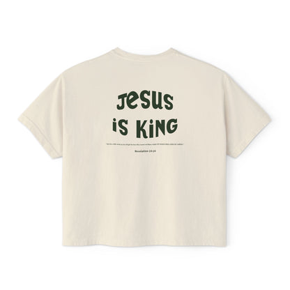Beige t-shirt with 'Jesus is King' text on a white background