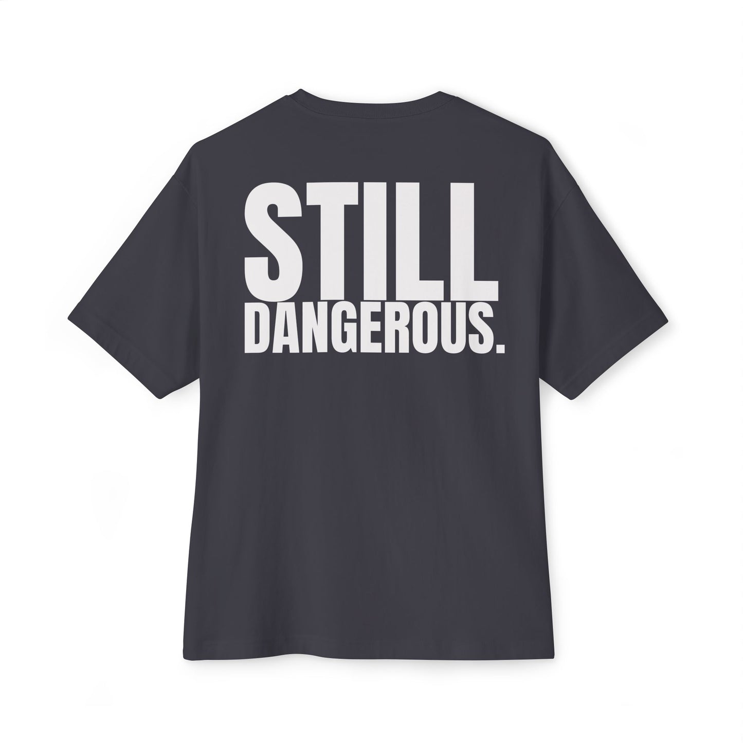 Close-up of Forgiven Still Dangerous Christian streetwear tee in black showing high-neck Forgiven text placement.