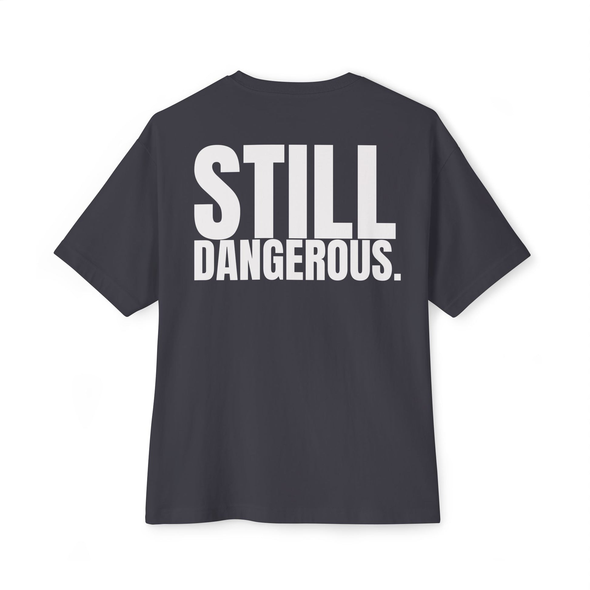Close-up of Forgiven Still Dangerous Christian streetwear tee in black showing high-neck Forgiven text placement.