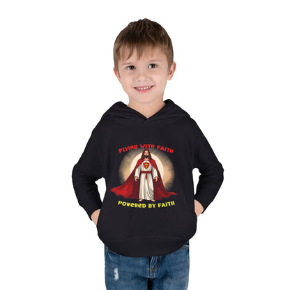 Toddler blue hoodie with Flying with Faith text and superhero Jesus graphic, vibrant Christian kids apparel

